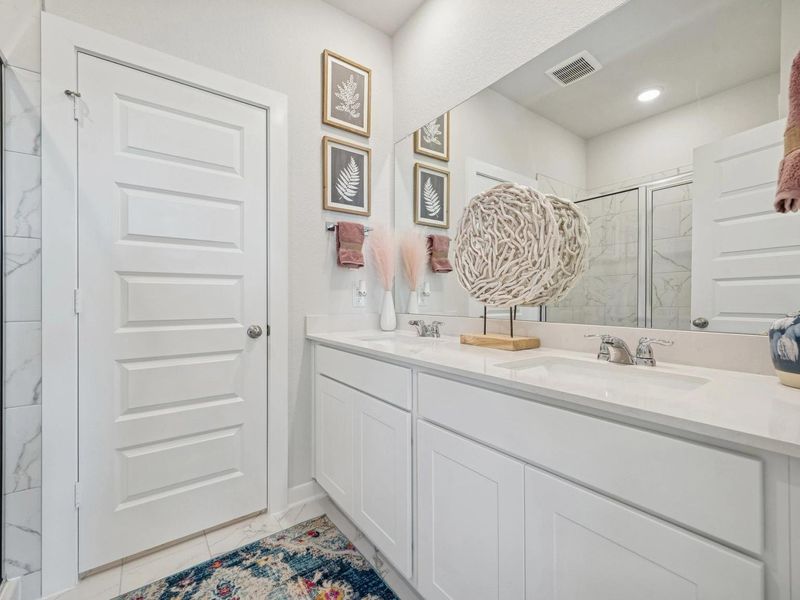 Furnished interior in a model home at Spring Branch Crossing in Conroe (Image 31).