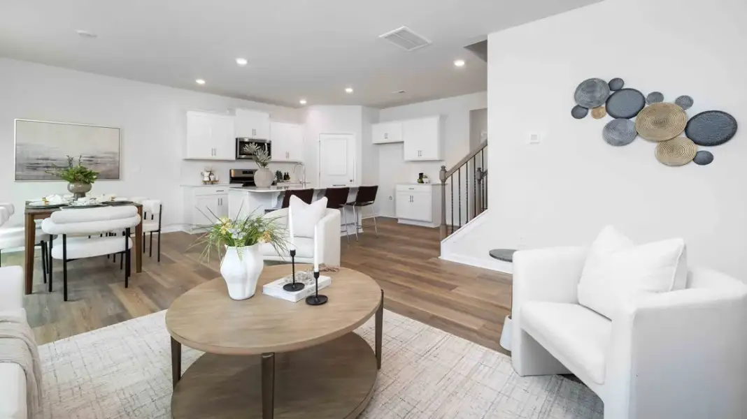 Furnished interior in a model home at Sweetwater Village in Rockwell (Image 14).