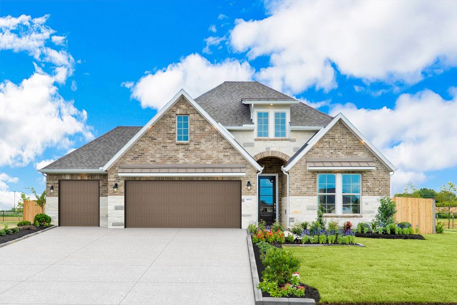 Front exterior of a home in the Mavera: Heritage Collection community, located in Conroe, TX (Image 3).