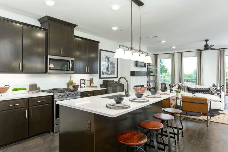 Furnished interior in a model home at Windsong Ranch Townhomes in Prosper (Image 34).