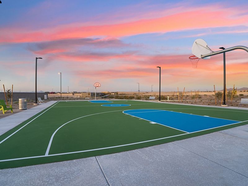 A sports field with a basketball hoop. A sports field with a basketball hoop.