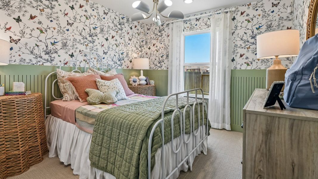 Exquisite floral wallpaper complemented by wicker accents exemplifies luxury in Cielo's bedroom design.