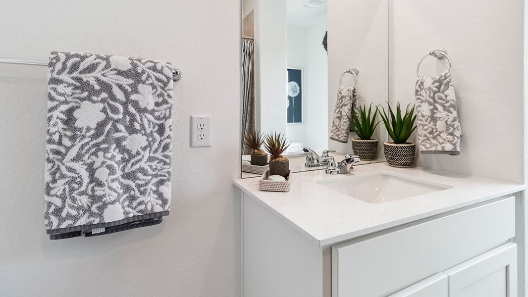 Furnished interior in a model home at Blue Ridge Ranch in San Antonio (Image 28).