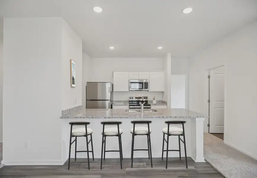 Furnished interior in a model home at Crescent Pointe in Carrollton (Image 4).