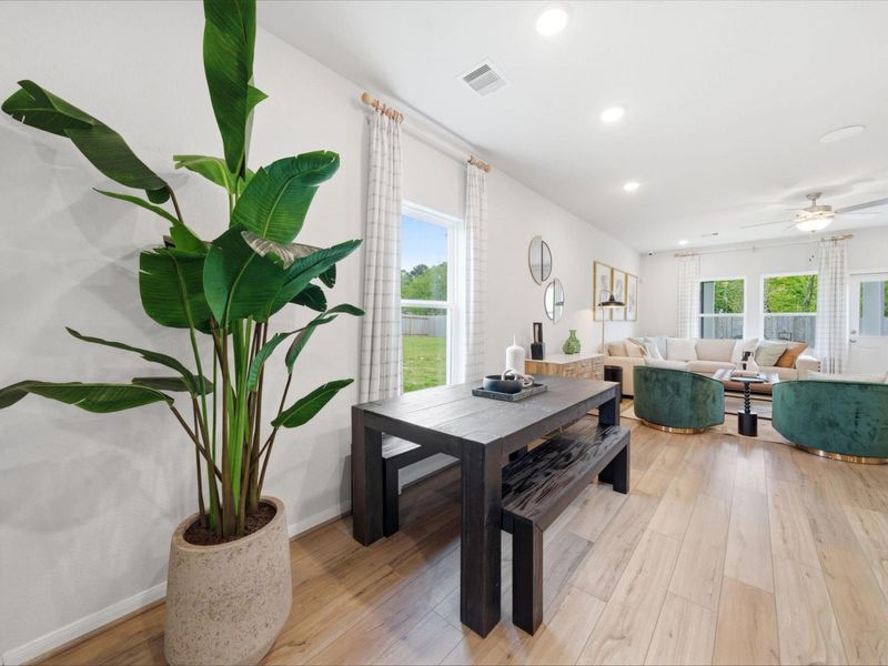 Furnished interior in a model home at Caney Creek Place in Conroe (Image 16).