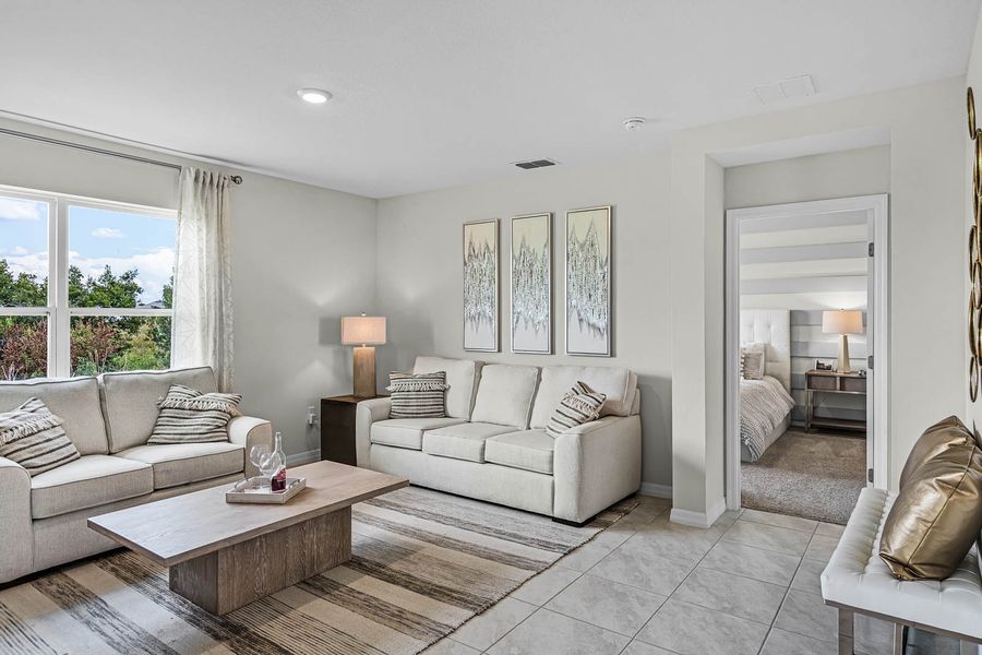 Furnished interior in a model home at Lakes at Laurel Highlands in Lakeland (Image 27).