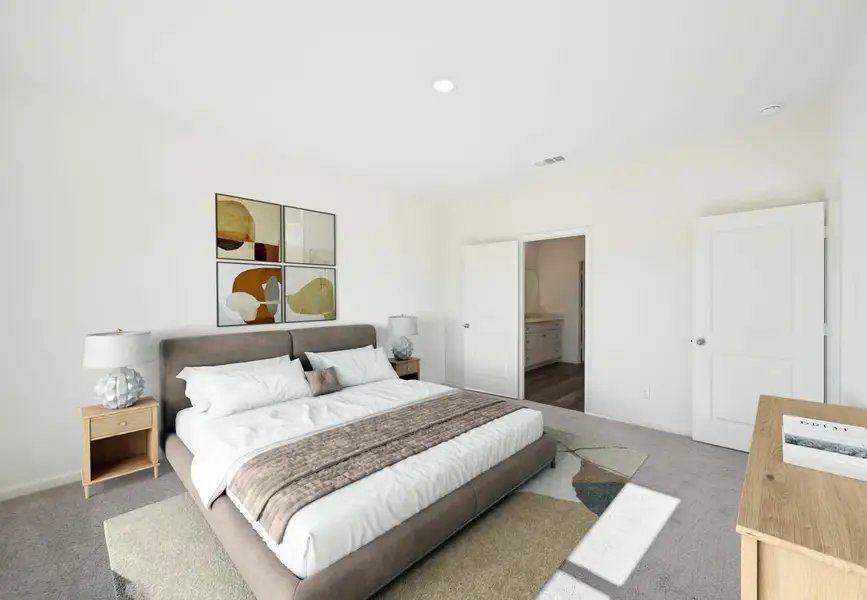 Furnished interior in a model home at Sunterra Lakes in Brookshire (Image 7).