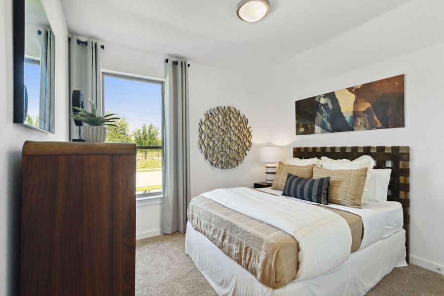 Bedroom in a LakePointe new home in Lavon TX by Trophy Signature Homes