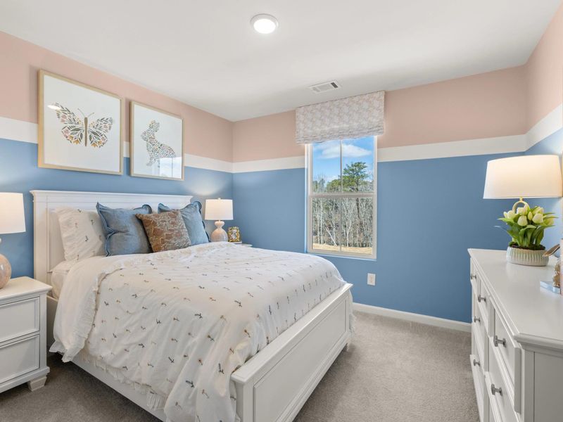 Furnished interior in a model home at The Bluffs in Canton (Image 13).