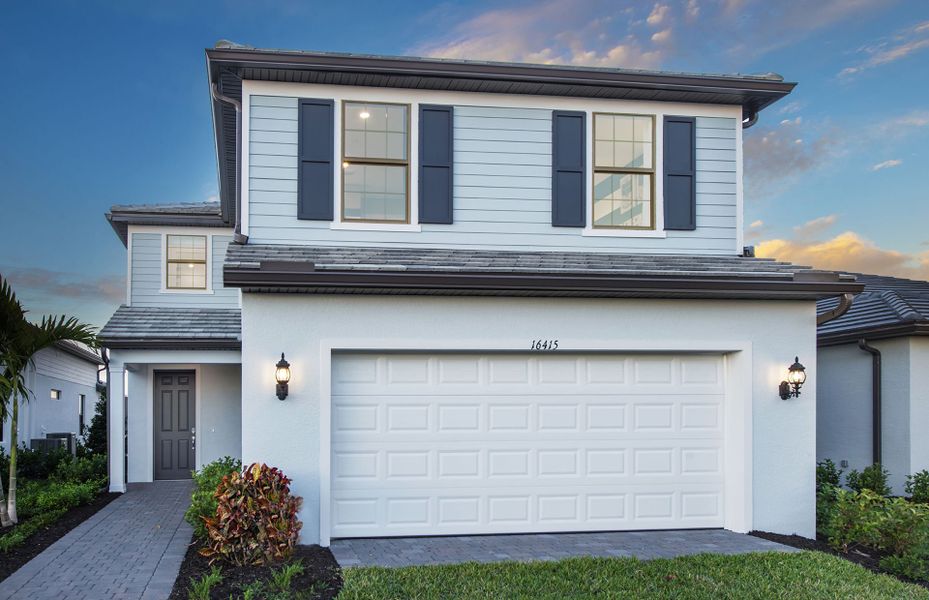 Two-story home in Terreno in Naples, FL with resort lifestyle communities offering modern houses