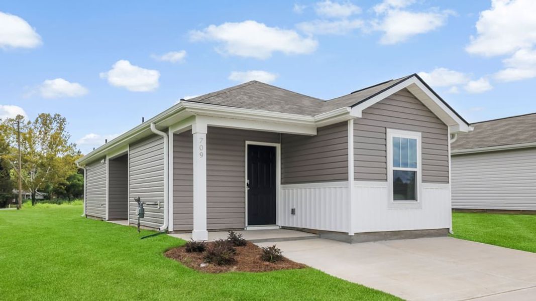 Front exterior of a home in the Village 3 community, located in Woodruff, SC (Image 2). Front exterior of a home in the Village 3 community, located in Woodruff, SC (Image 2).