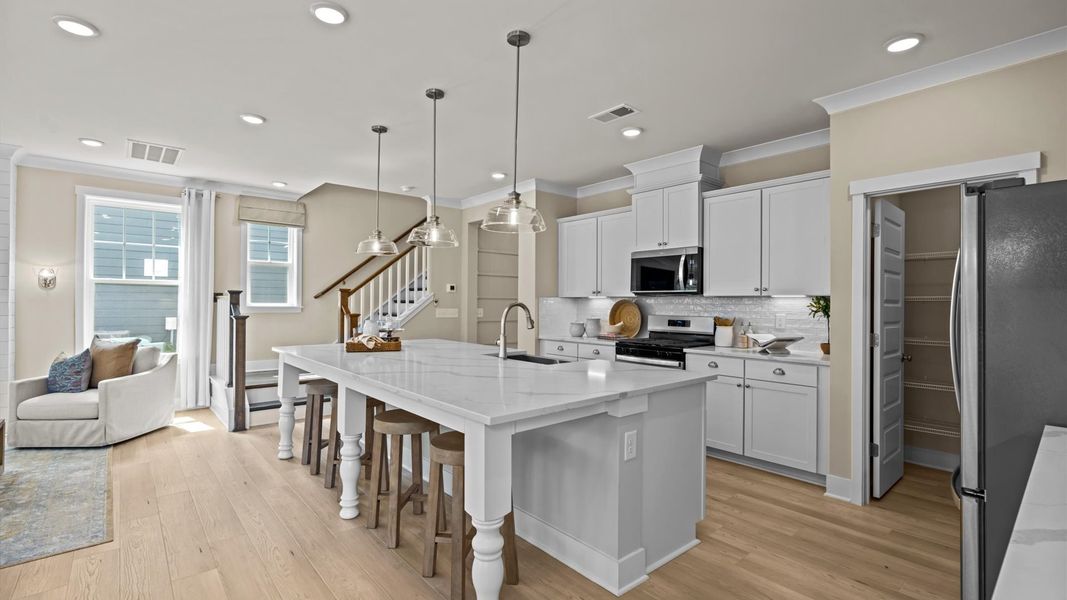 Furnished interior in a model home at Station Pointe Phase 2 in Angier (Image 19).