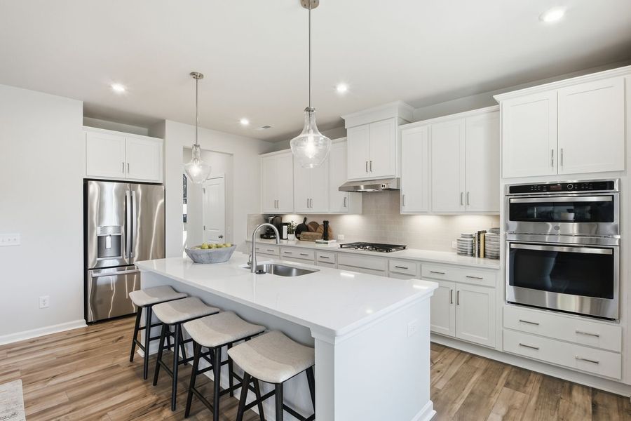 Furnished interior in a model home at Clairmont in Charlotte (Image 6).