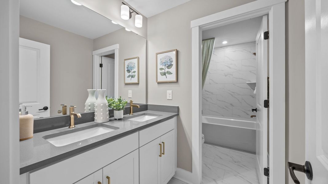 Furnished interior in a model home at Farms at Bellingham in Mooresville (Image 31).