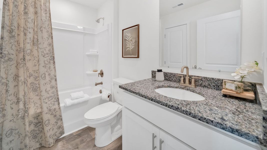 Furnished interior in a model home at Spring Lake Farms Townhomes in Knoxville (Image 28).