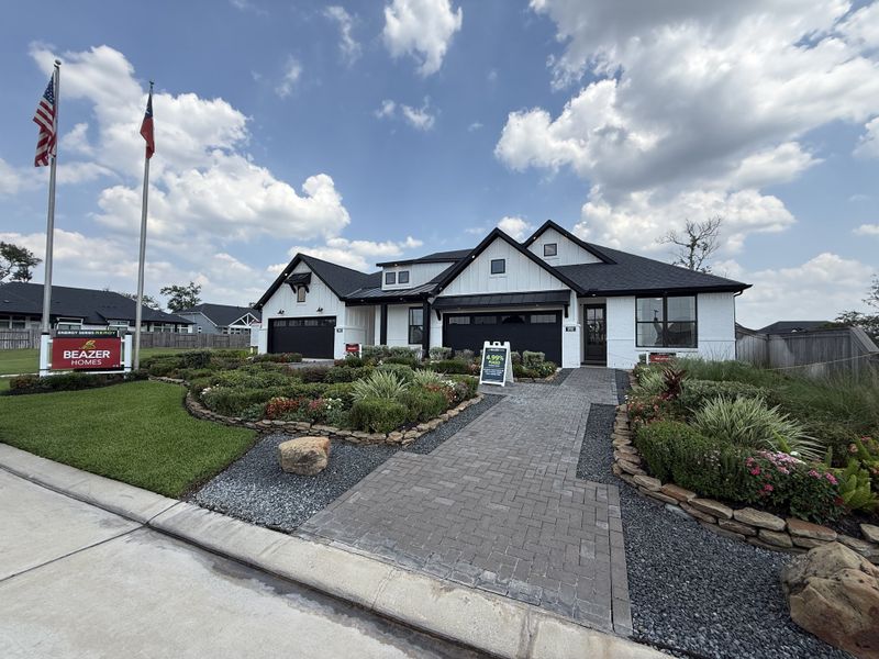 A beautiful modern home with manicured landscaping in Sienna by Beazer Homes (Missouri City, TX). A beautiful modern home with manicured landscaping in Sienna by Beazer Homes (Missouri City, TX).