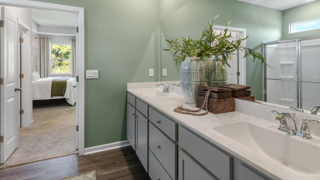 Furnished interior in a model home at Grayson Park in Leland (Image 19).