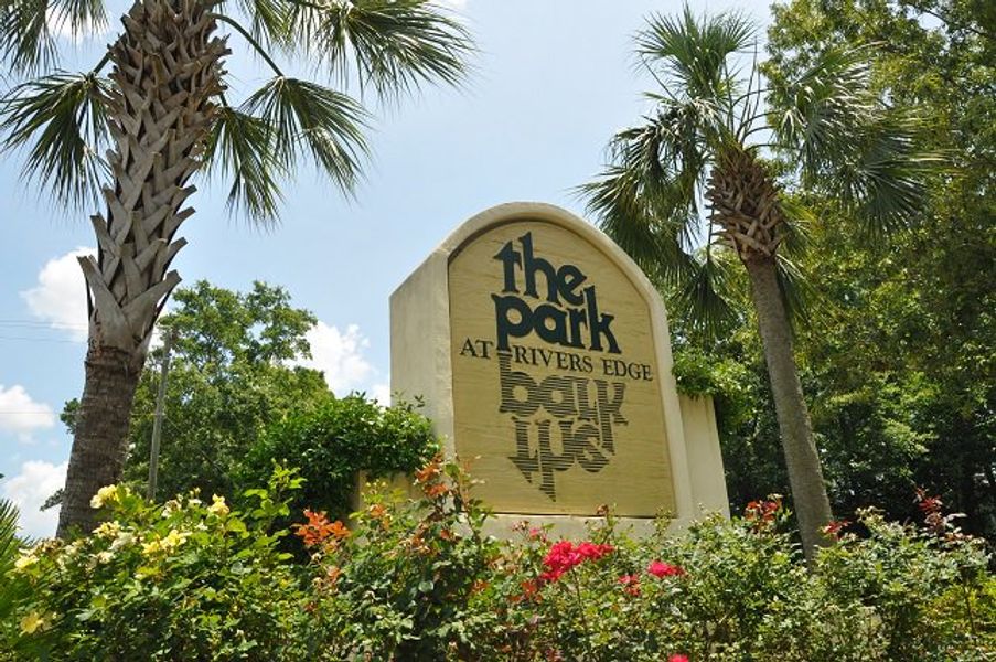 Entrance to the Tributary III at The Park at Rivers Edge community in North Charleston, SC, featuring signage and landscaping (Image 4). Entrance to the Tributary III at The Park at Rivers Edge community in North Charleston, SC, featuring signage and landscaping (Image 4).