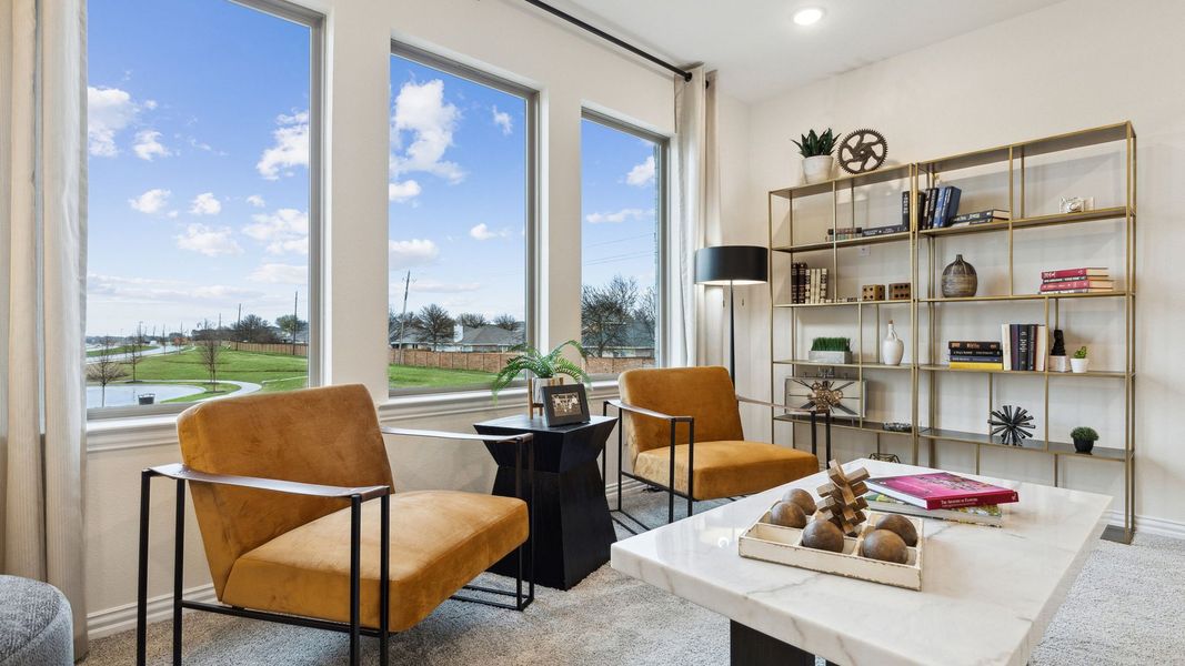 Furnished interior in a model home at Painted Tree - Village District in McKinney (Image 10).
