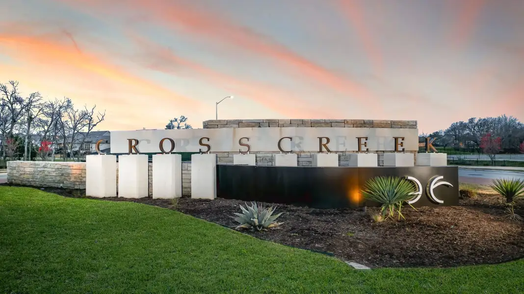 Entrance to the Cross Creek community in Cedar Park, TX, featuring signage and landscaping (Image 2).