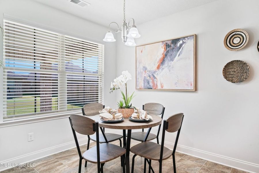 Furnished interior in a model home at Emerald Heights in Pensacola (Image 6).