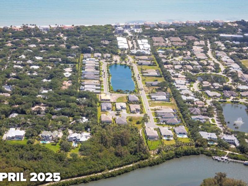 Aerial view of the The Strand community in Vero Beach, FL, showing layout and nearby surroundings (Image 9).