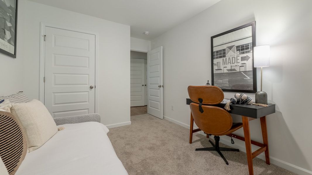 Furnished interior in a model home at Wellington Park in Lithonia (Image 23).