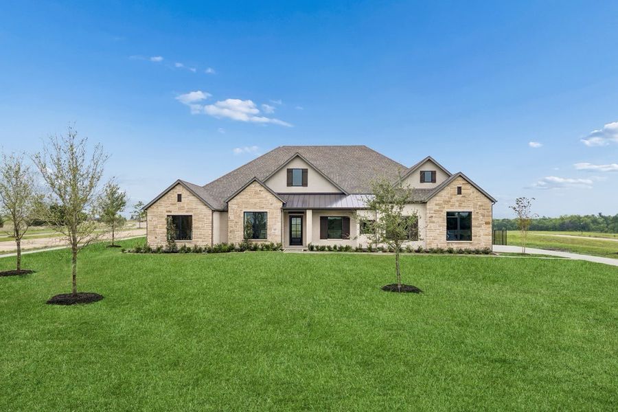 Front exterior of a home in the Discovery Lakes community, located in Rockwall, TX (Image 2).