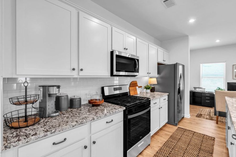 Furnished interior in a model home at The View at Groover's Lake in Lithia Springs (Image 8).