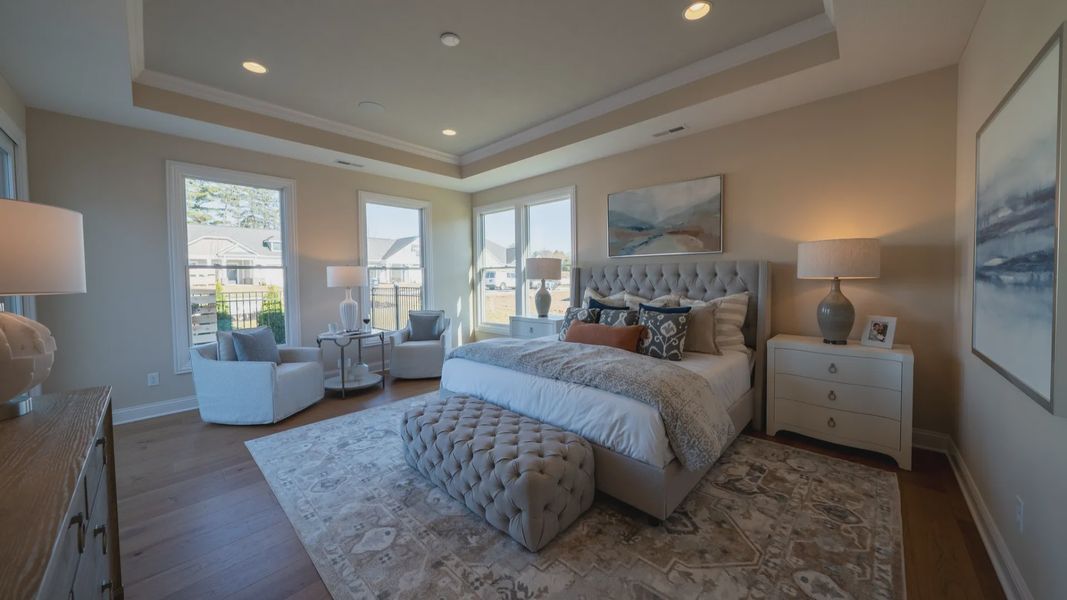 Furnished interior in a model home at The Courtyards on the Greenway in Matthews (Image 12).