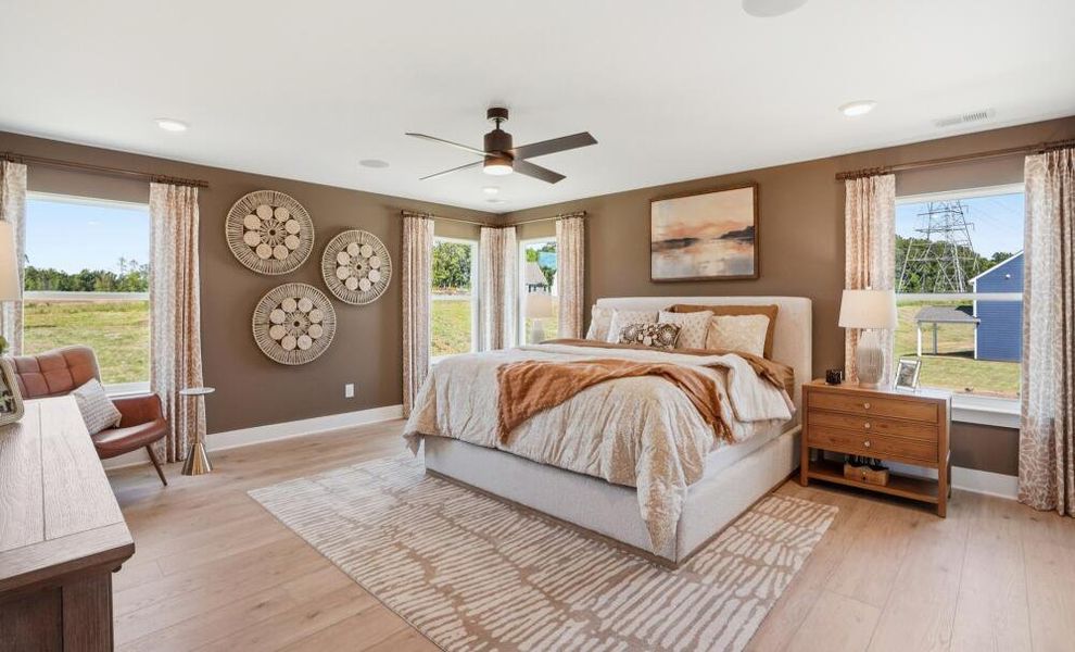 Furnished interior in a model home at Enclave at Riverdale in Huntersville (Image 21). Furnished interior in a model home at Enclave at Riverdale in Huntersville (Image 21).