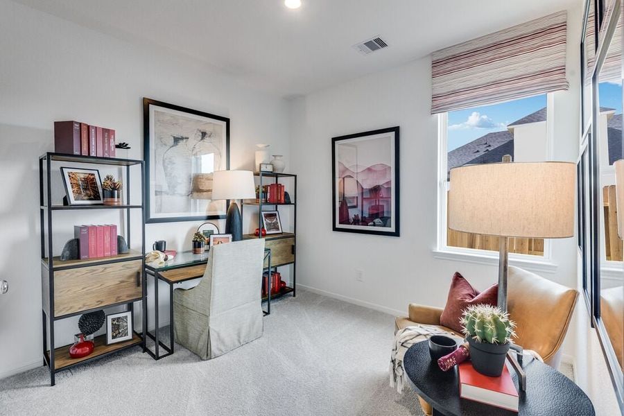 Furnished interior in a model home at Raburn Reserve 50s in Tomball (Image 51).