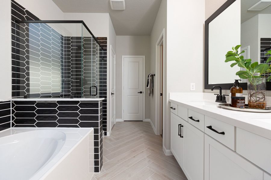 Furnished interior in a model home at Bridgeland: Signature in Cypress (Image 7).