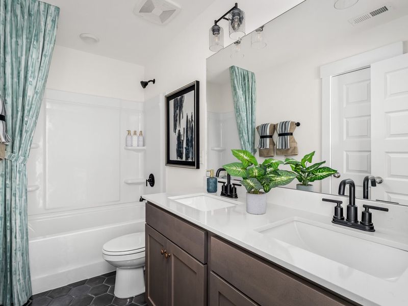 Furnished interior in a model home at Woods Crossing in Gallatin (Image 33).