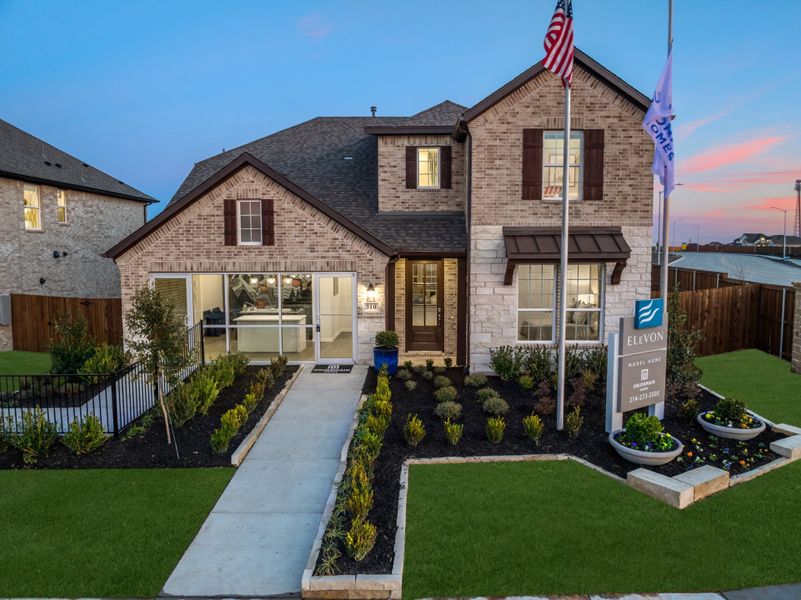 Front exterior of a home in the Elevon community, located in Lavon, TX (Image 30).