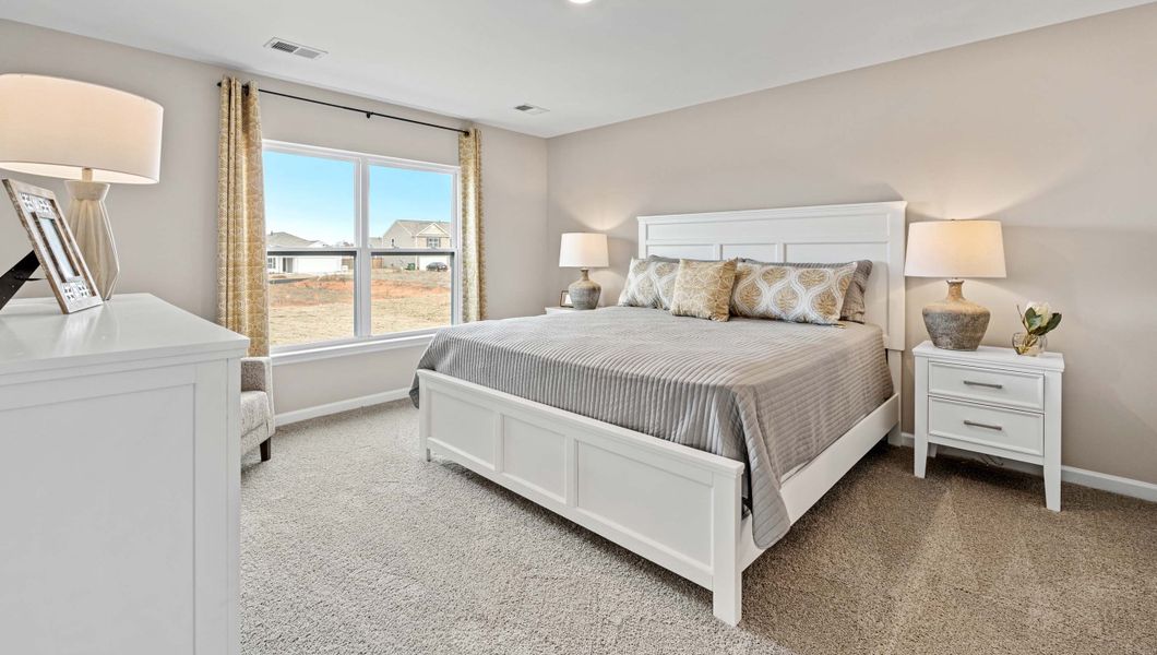 Furnished interior in a model home at Lightwood Cottages in Moore (Image 22).