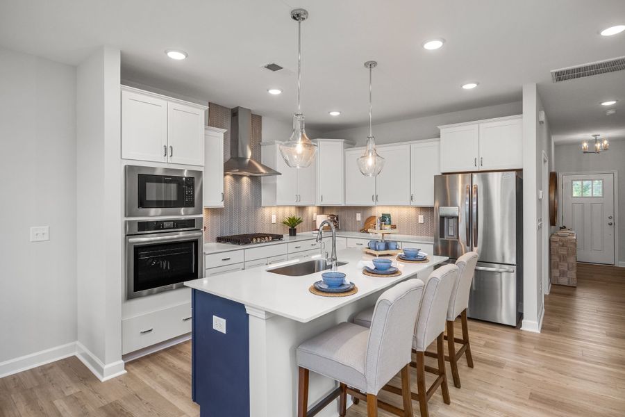 Furnished interior in a model home at Gregory Village Townhomes in Lillington (Image 29).