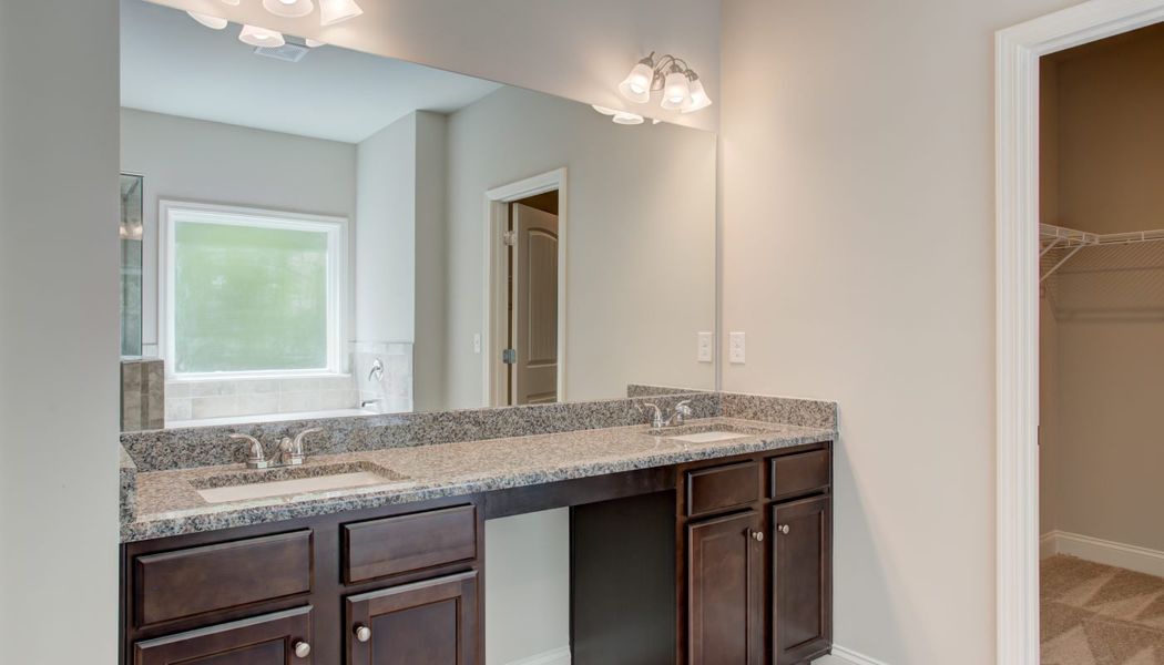 Furnished interior in a model home at Cove Lake Estates in Conley (Image 13).