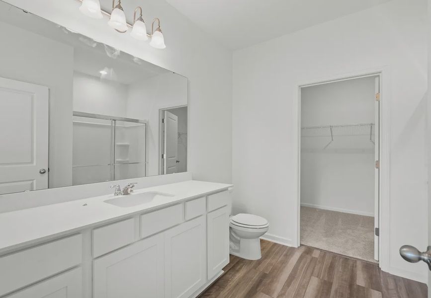 Furnished interior in a model home at Sunset Oaks in Maxwell (Image 13).