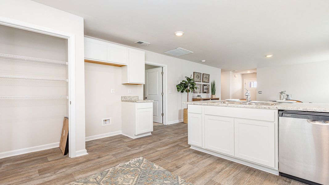 Furnished interior in a model home at Silver Oaks in Ocean Isle Beach (Image 12).