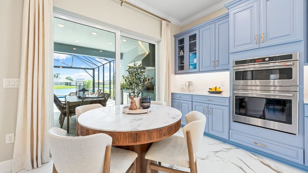 Furnished interior in a model home at Esplanade at Coasterra in Palmetto (Image 9).