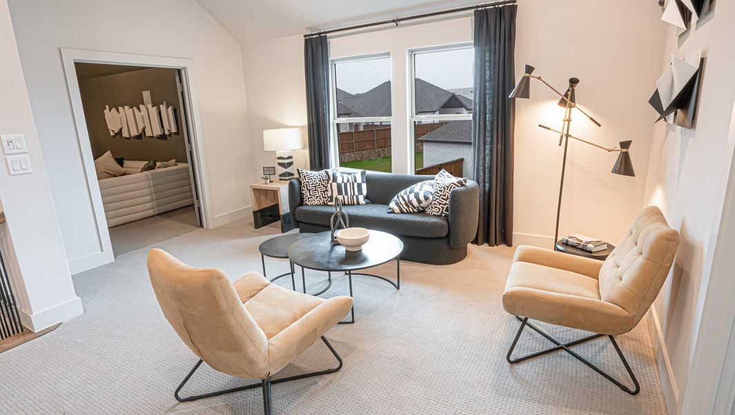 Furnished interior in a model home at Las Lomas in Forney (Image 18).