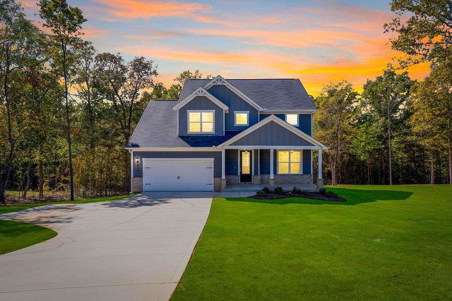 Front exterior of a home in the Waters Edge community, located in Mansfield, GA (Image 8).