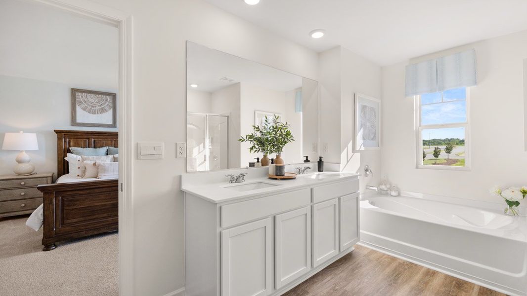 Furnished interior in a model home at Preserve at Dove Creek in Statham (Image 19).