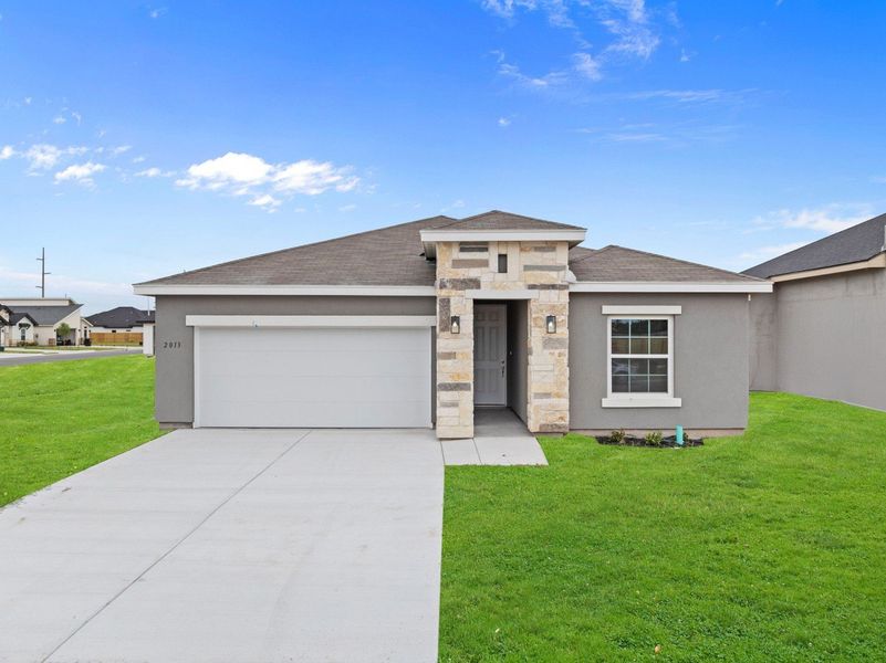 Front exterior of a home in the Monte Cielo community, located in Weslaco, TX (Image 27). Front exterior of a home in the Monte Cielo community, located in Weslaco, TX (Image 27).