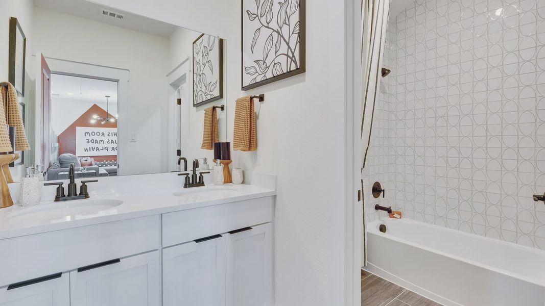 Furnished interior in a model home at Creeks Crossing in Elgin (Image 36).