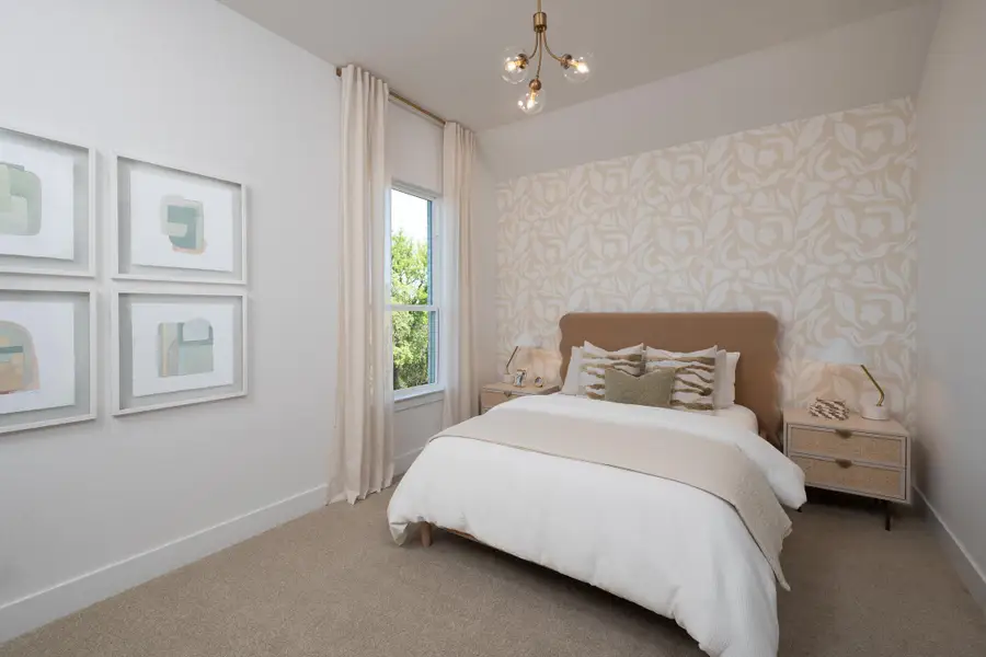 Furnished interior in a model home at Megan's Landing 70's in Castroville (Image 9).