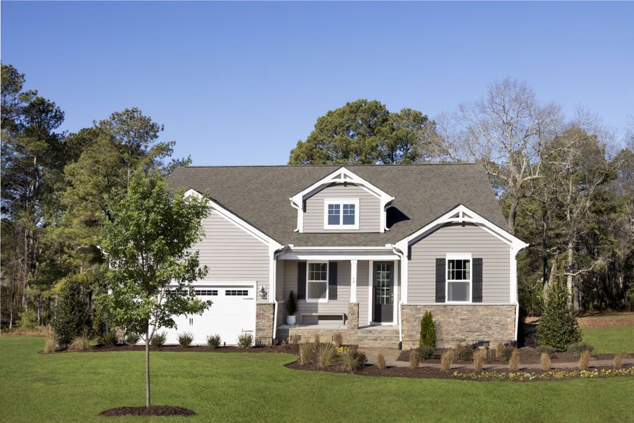 Front exterior of a home in the Bloom community, located in Fuquay Varina, NC (Image 9). Front exterior of a home in the Bloom community, located in Fuquay Varina, NC (Image 9).