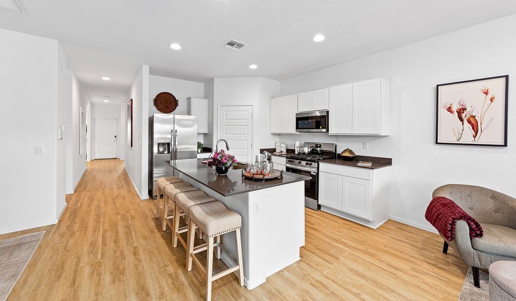 Furnished interior in a model home at Barnett Village in Marana (Image 6).