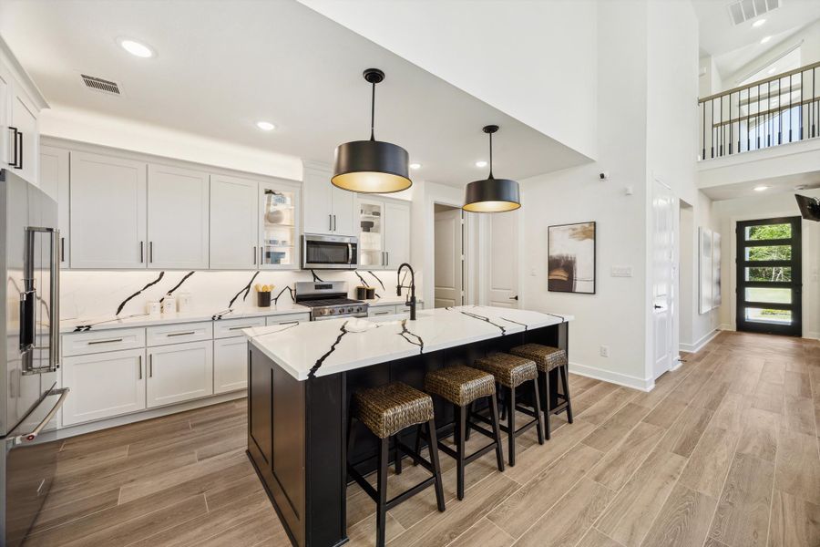 Furnished interior in a model home at ARTAVIA® - 40' in Conroe (Image 33).